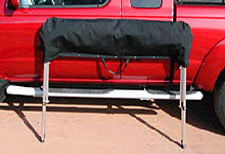 softopper pickup truck bed topper cover shown
                  stored in included storage bag.